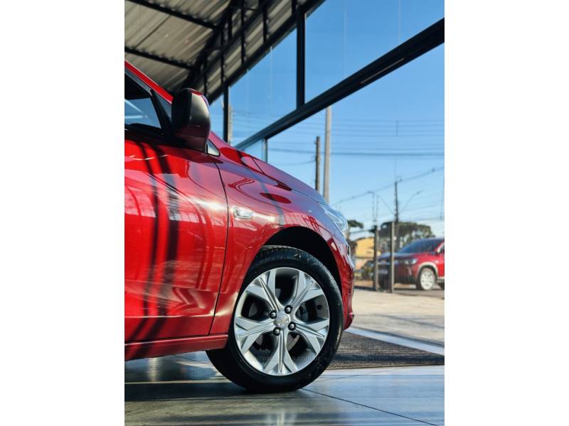 CHEVROLET - ONIX - 2024/2024 - Vermelha - R$ 95.900,00