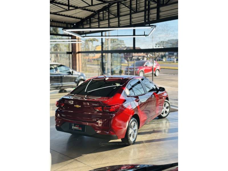 CHEVROLET - ONIX - 2024/2024 - Vermelha - R$ 95.900,00